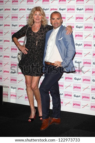 Debbie Moore and Louie Spence arriving for the Prima Comfort Fashion Awards 2012, At Evolution, Battersea Park, London. 13/09/2012 Picture by: Alexandra Glen