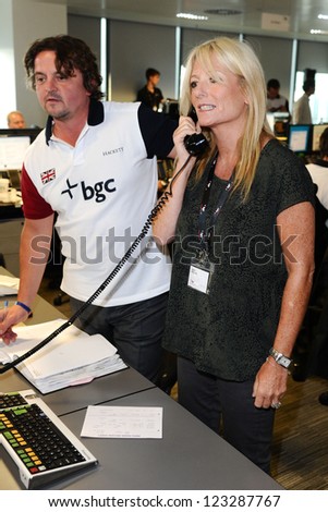Gaby Roslin on the trading floor of BGC as part of the BGC Charity Day 2012, Canary Wharf, London. 11/09/2012 Picture by: Steve Vas