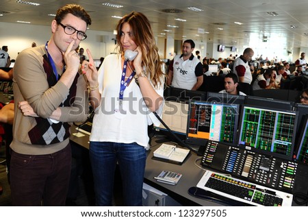 Dave Berry and Lisa Snowdon on the trading floor of BGC as part of the BGC Charity Day 2012, Canary Wharf, London. 11/09/2012 Picture by: Steve Vas
