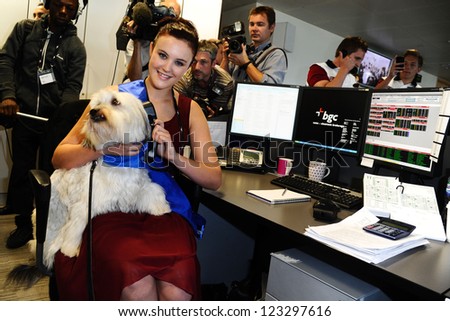 Ashleigh and Pudsey on the trading floor of BGC as part of the BGC Charity Day 2012, Canary Wharf, London. 11/09/2012 Picture by: Steve Vas