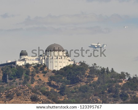 The Space Shuttle Endeavour does a flyby over the Griffith Observatory, Los Angeles before landing at LAX. September 21, 2012  Los Angeles, CA Picture: Paul Smith