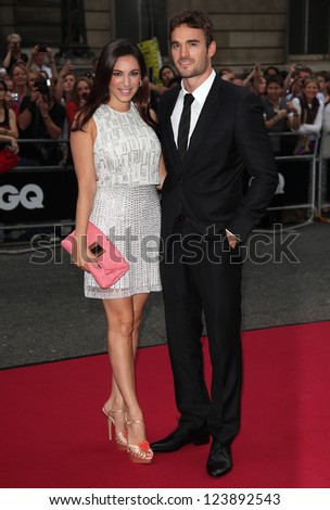 Kelly Brook and Thom Evans arriving for the 2012 GQ Men Of The Year Awards, Royal Opera House, London. 05/09/2012 Picture by: Alexandra Glen