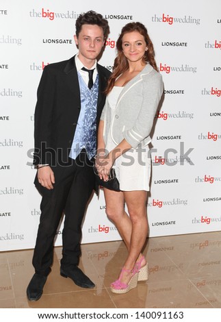 Tyger Drew Honey and Maia Penfold arriving for the The Big Wedding Screening at the May Fair Hotel, London. 23/05/2013