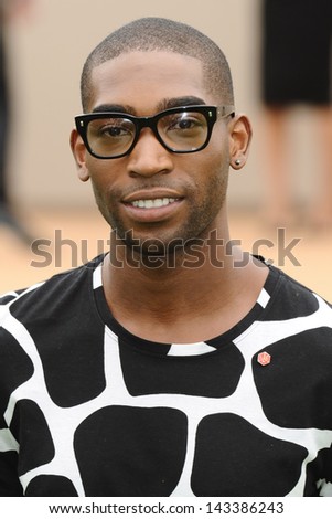 Tinie Tempah arriving for the Burberry Prorsum Menswear show as part of London Collection Men SS14, Perks Field, Kensington, London. 18/06/2013