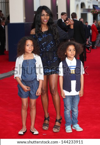 Sinitta and her son and daughter arriving for the Charlie And The Chocolate Factory Press Night, at Theatre Royal, London. 25/06/2013