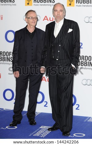 Mick Jones and Nicky Headon (The Clash) arriving for the Nordoff Robbins Silver Clef Awards 2013 at the Hilton Park Lane, London. 28/06/2013