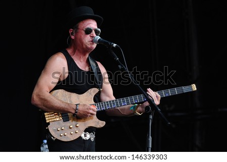 Mark King from Level 42 at Magic Summer Live in Stoke Park, Guilford, Surrey. 13/07/2013
