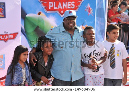 Cedric the Entertainer & family at the world premiere of his movie Disney\'s Planes at the El Capitan Theatre, Hollywood. August 5, 2013  Los Angeles, CA