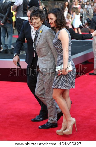 Ronnie Wood and Sally Humphreys arriving for the One Direction This is Us World film premiere, London. 20/08/2013