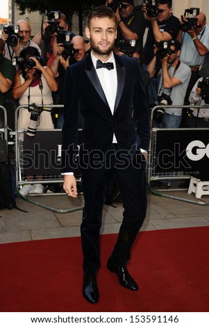 Douglas Booth arriving for the 2013 GQ Men Of The Year Awards, at the Royal Opera House, London. 03/09/2013