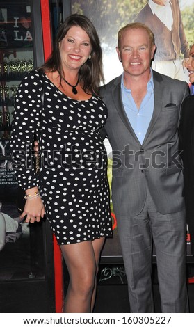 Neal McDonough & wife at the premiere of \