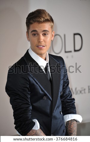 ANTIBES, FRANCE - MAY 22, 2014: Justin Bieber  at the 21st annual amfAR Cinema Against AIDS Gala at the Hotel du Cap d\'Antibes.