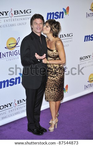 Lisa Rinna & Harry Hamlin at music mogul Clive Davis\' annual pre-Grammy party at the Beverly Hilton Hotel. February 9, 2008  Los Angeles, CA Picture: Paul Smith / Featureflash