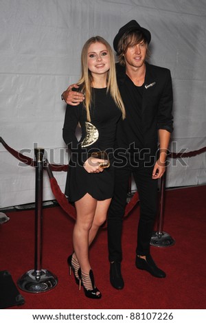 Rose McIver & date at the Los Angeles premier of her new movie \