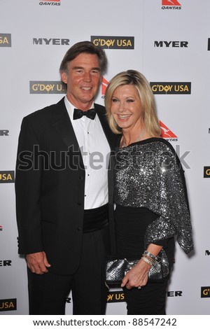 Olivia Newton-John & date at the 2010 G\'Day USA Australia Week Black Tie Gala at the Grand Ballroom at Hollywood & Highland. January 16, 2010  Los Angeles, CA Picture: Paul Smith / Featureflash