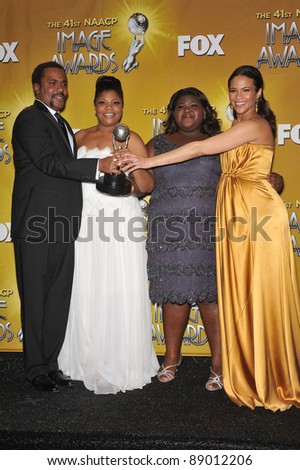 Director Lee Daniels with Mo\'Nique (left), Gabourey Sidibe & Paula Patton at the NAACP Image Awards at the Shrine Auditorium. February 26, 2010  Los Angeles, CA Picture: Paul Smith / Featureflash