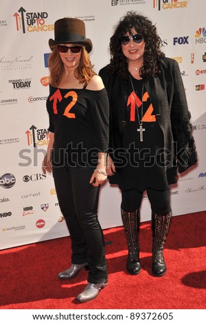 Nancy Wilson (left) & Anne Wilson of Heart at the Stand Up To Cancer event at Sony Pictures Studios, Culver City. September 10, 2010  Culver City, CA Picture: Paul Smith / Featureflash