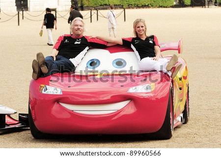 Richard and Holly Branson at a photocall to promote the new Disney Pixar Film Cars 2 with Marussia Virgin Racing. Horse Guards Parade London  04/07/2011 Picture by: Simon Burchell / Featureflash