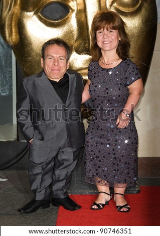 Warwick Davis and wife arriving for the BAFTA Children's Awards 2011 at the Hilton Park Lane, London. 27/11/2011 Picture by: Simon Burchell / Featureflash