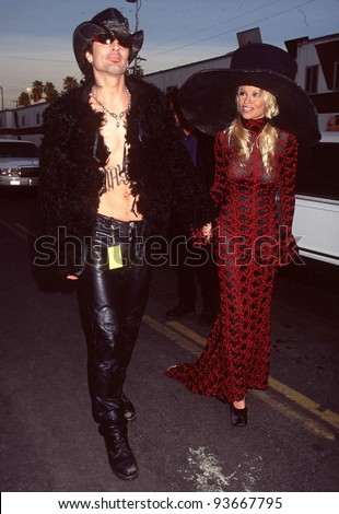 27JAN97:  Baywatch star PAMELA ANDERSON LEE & husband TOMMY LEE at the American Music Awards in Los Angeles. Pix: PAUL SMITH