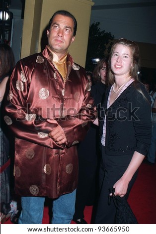 04AUG97:  Actor STEVEN SEAGAL & girlfriend ARISSA WOLF at the premiere of \