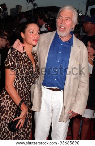 04AUG97:  Actor JAMES COBURN & wife PAULA at the premiere of \
