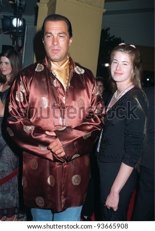 04AUG97:  Actor STEVEN SEAGAL & girlfriend ARISSA WOLF at the premiere of \