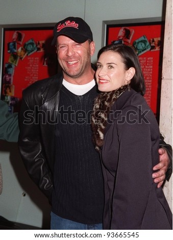 05DEC97: Actress DEMI MOORE & actor husband BRUCE WILLIS  at world premiere of her new movie, \
