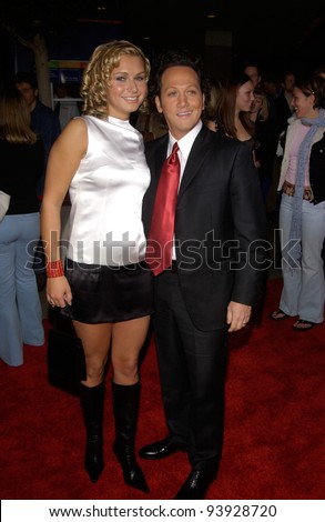 Actor ROB SCHNEIDER & date at the Los Angeles premiere of his new movie The Hot Chick. 02DEC2002.   Paul Smith / Featureflash