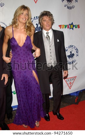 Pop star ROD STEWART & girlfriend model PENNY LANCASTER at the 15th Carousel of Hope Ball at the Beverly Hilton Hotel, Beverly Hills. 15OCT2002.   Paul Smith / Featureflash