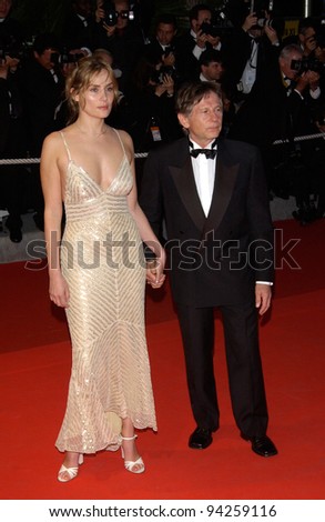Director ROMAN POLANSKI & wife actress EMMANUELLE SEIGNER at the Cannes Film Festival for the premiere of his new movie The Pianist. 24MAY2002.   Paul Smith / Featureflash