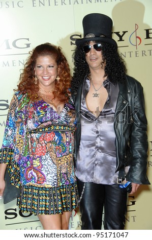 SLASH, of Velvet Revolver, & wife PERLA FERRAR at the Sony BMG post-Grammy Party at the Beverly Hills Hotel. February 12, 2007  Beverly Hills, CA Picture: Paul Smith / Featureflash