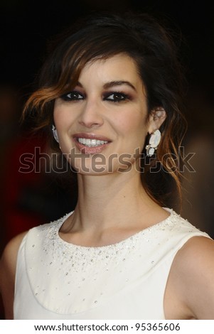 Berenice Marlohe arriving for the BAFTA Film Awards 2012 at the Royal Opera House, Covent Garden, London. 12/02/2012  Picture by: Steve Vas / Featureflash