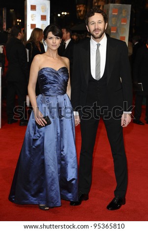 Dawn Porter and Chris O\'Dowd arriving for the BAFTA Film Awards 2012 at the Royal Opera House, Covent Garden, London. 12/02/2012  Picture by: Steve Vas / Featureflash