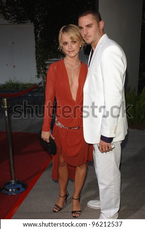 Actress TARYN MANNING & boyfriend at the Los Angeles premiere of her new movie Hustle & Flow at the Cinerama Dome, Hollywood. July 20, 2005  Los Angeles, CA  2005 Paul Smith / Featureflash