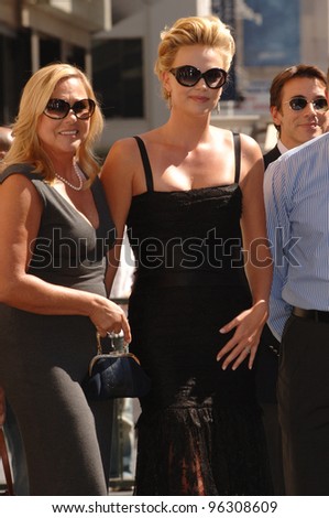 Actress CHARLIZE THERON & mother on Hollywood Boulevard where she was honored with the 2,291st star on the Hollywood Walk of Fame. September 29, 2005  Los Angeles, CA.  2005 Paul Smith / Featureflash