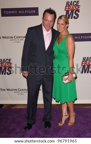 Actor TOM ARNOLD & wife at the 12th Annual Race to Erase MS Gala themed \