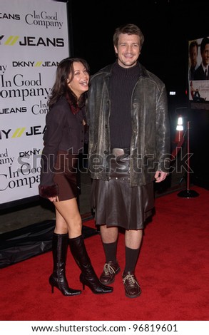 Dec 6, 2004; Los Angeles, CA: Actor NATHAN FILLIAN & date at the world premiere of In Good Company, at the Grauman\'s Chinese Theatre, Hollywood.