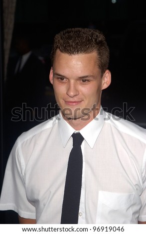 Actor AUSTIN NICHOLS & girlfriend at the world premiere, in Beverly Hills, of his new movie romantic tennis comedy Wimbledon. September 13, 2004