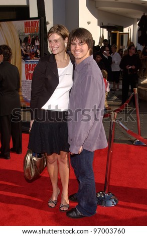 Actor JASON RITTER & girlfriend at the Los Angeles premiere of his new movie Raise Your Voice. October 3, 2004