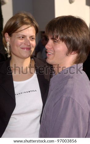 Actor JASON RITTER & girlfriend at the Los Angeles premiere of his new movie Raise Your Voice. October 3, 2004