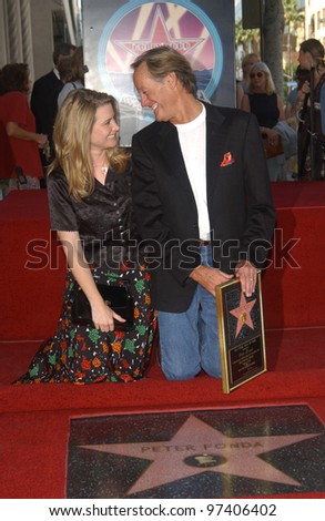 Actor PETER FONDA with daughter actress BRIDGET FONDA on Hollywood Blvd where he was honored with the 2,241st star on the Hollywood Walk of Fame. Oct 22, 2003  Paul Smith / Featureflash