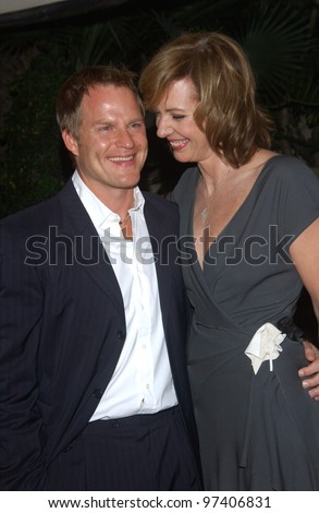Actress ALISON JANNEY & boyfriend at party in Los Angeles to celebrate to 100th episode of TV series The West Wing. November 1, 2003  Paul Smith / Featureflash