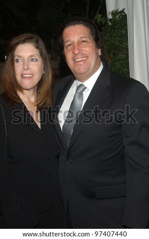 Warner Bros. TV chairman PETER ROTH & wife at party in Los Angeles to celebrate to 100th episode of TV series The West Wing. November 1, 2003  Paul Smith / Featureflash