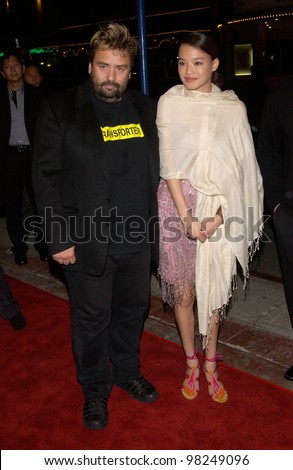 Producer LUC BESSON & actress SHU QI at the Los Angeles premiere of their new movie The Transporter. 02OCT2002.  Paul Smith / Featureflash