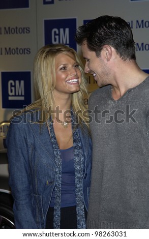 Pop stars JESSICA SIMPSON & boyfriend NICK LACHEY at the General Motors \