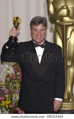 CONRAD W. HALL, with the award for his late father Conrad L. Hall who won for Best Cinematography at the 75th Annual Academy Awards at the Kodak Theatre, Hollywood. March 23, 2003