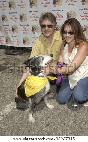Actor DAVE FOLEY & wife CRISSY GUERRO at the Best Friends Lint Roller Party at Santa Monica Airport, California. The event was held to benefit the Best Friends Animal Sanctuary. march 2003