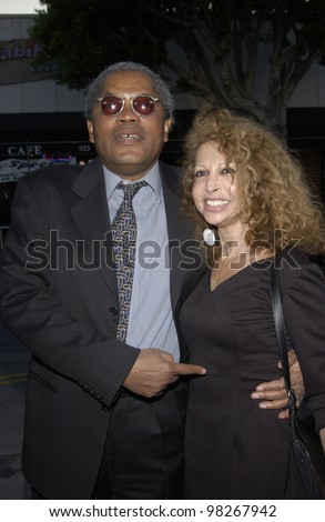 Actor CLARENCE WILLIAMS III & date at the Los Angeles premiere of his movie It Runs In The Family. April 7, 2003