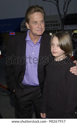 Actors MICHAEL DOUGLAS & RORY CULKIN at the Los Angeles premiere of their movie It Runs In The Family. April 7, 2003